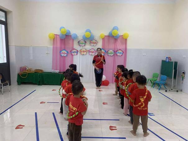 A group of children in a room

AI-generated content may be incorrect.